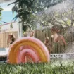 Picture of Sunny Life Inflatable Rainbow Water Sprinkler - Peach Pink